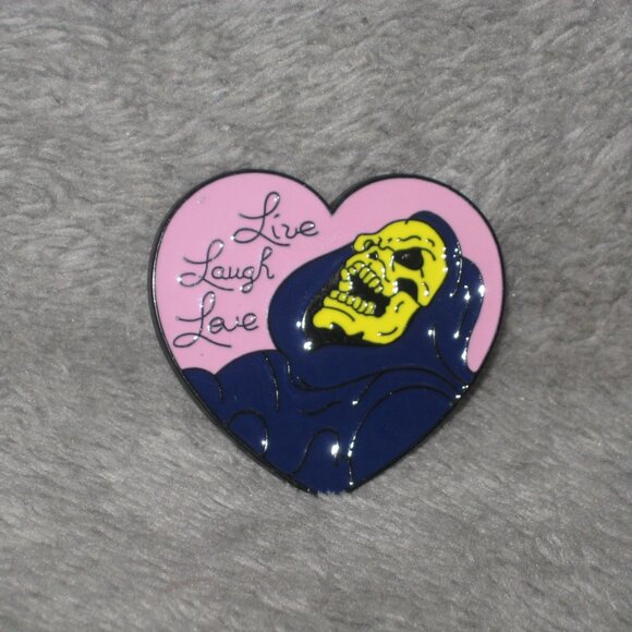 1980s Cartoon He-Man MOTU Skeletor Live Laugh Love Metal Enamel Pin 251036A2 - Picture 1 of 8